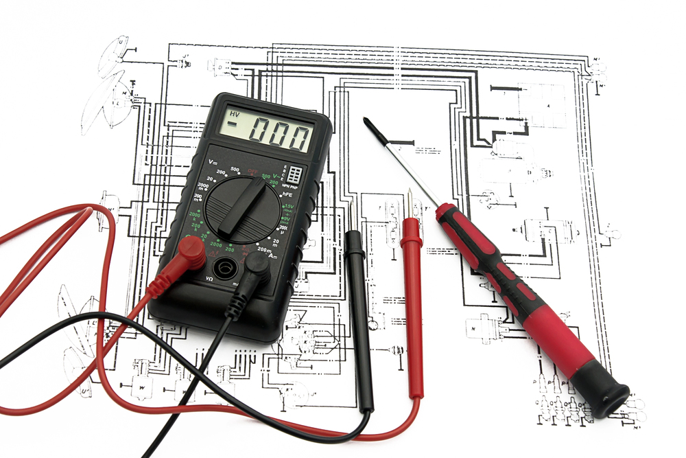 Licensed electrician in Pittsburgh performing an electric panel upgrade to improve safety, reduce flickering lights, and meet growing energy needs in older homes